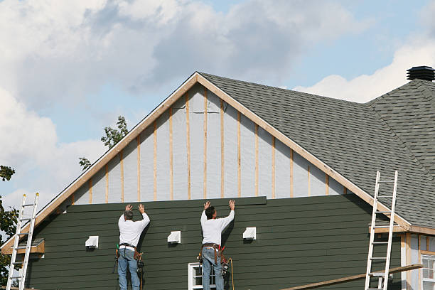 Professional Storm Damage Siding Repair technician working in South Salem, OH